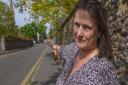 Sarah Walker pointing to where she thinks she may have seen the ghost carriage driven by Sir Thomas near Bishop's Bridge in Norwich. Picture: Danielle Booden