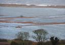 Cley (pictured) is one of the coastal areas where a flood warning has been issued