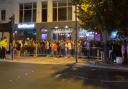 People queue up for Bar and Beyond in Norwich on Saturday night.