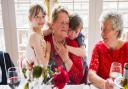 Phyllis Ecclestone at her 90th birthday celebrations. She is seen with two great grandchildren and family friend Dot Hill