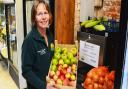 Emma Tacon with locally-sourced produce and the new milk dispenser at The Tacons farm shop in Rollesby