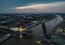 The sun sets over the River Yare in Great Yarmouth as the new Herring Bridge's western leaf is lowered for the first time. Photo: Luke Martin Photography.