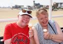 Holidaymakers Rose Jolly, left, and Diane Armsby, enjoying the hazy sunny weather in Great Yarmouth in 2023. Picture - Denise Bradley