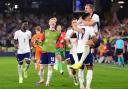 England's Harry Kane and Ollie Watkins celebrate following the UEFA Euro 2024 semi-final match at the BVB Stadion Dortmund.