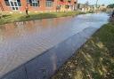 Newport Road in Hemsby pictured flooded after a water main burst