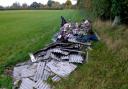 A photograph showing fly-tipped waste - Illegally dumped waste causes damage and cost to communities and the environment