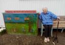 Joy Hunt, 97, next to her winning bin design at Caister playing field.