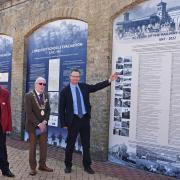 Waveney MP Peter Aldous unveils a timeline on Lowestoft station earlier this month to mark the 175th anniversary of the railway arriving in the town.