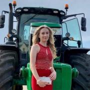 Aspiring farmer Ruby Travis, 16, from Filby, rode a John Deere tractor to the Flegg High school prom