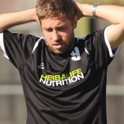 Robbie Harris, the new first-team boss of Fakenham Town, shows the strain during the Ghosts' weekend defeat. Picture: IAN BURT