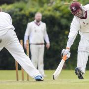 Cricket action from Downham Market v Old Buckingham - Nick Kelly runs out Old Buckingham's  Peter Free. Picture: Matthew Usher.