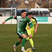 Gorleston's Jake Spooner drives forward with the ball