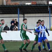 Adam Tann (centre) equalises for Gorleston on his debut.