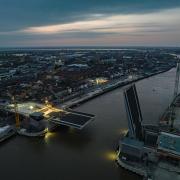 The sun sets over the River Yare in Great Yarmouth as the new Herring Bridge's western leaf is lowered for the first time. Photo: Luke Martin Photography.