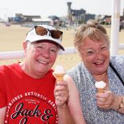 Holidaymakers Rose Jolly, left, and Diane Armsby, enjoying the hazy sunny weather in Great Yarmouth in 2023. Picture - Denise Bradley