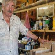 A boat builder has crafted 18 hedgehog nest and hibernation houses, which are set to be distributed throughout the village