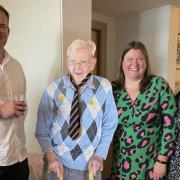 A cardboard cutout of John Calthorpe with his three grandchildren at a celebration of his life at the Pier Hotel in Gorleston.