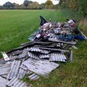 A photograph showing fly-tipped waste - Illegally dumped waste causes damage and cost to communities and the environment