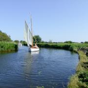 A boat navigating Dungeon Corner under sail