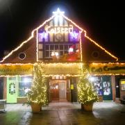 Caister Village Hall illuminated for Christmas.