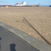 Police officers on patrol in Great Yarmouth seafront.