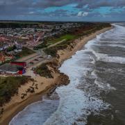 Waves batter the coast at Hemsby during high tide.