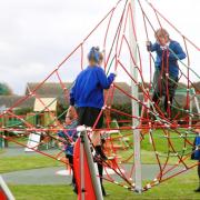 Children enjoying the upgraded playground at the King George V playing field in Caister.