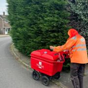 The council has told a homeowner that they must cut their hedge back as it has made the pavement unusable