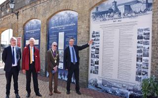 Waveney MP Peter Aldous unveils a timeline on Lowestoft station earlier this month to mark the 175th anniversary of the railway arriving in the town.