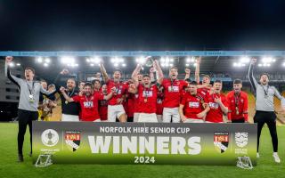 Downham Town lift the Norfolk Hire Senior Cup at Carrow Road